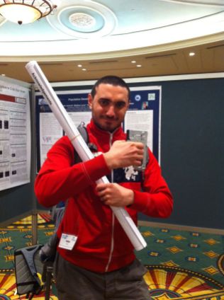 Rasit (my husband) armed and ready to put up his poster on phylogeography of inverts in the Mediterranean and Black Sea.